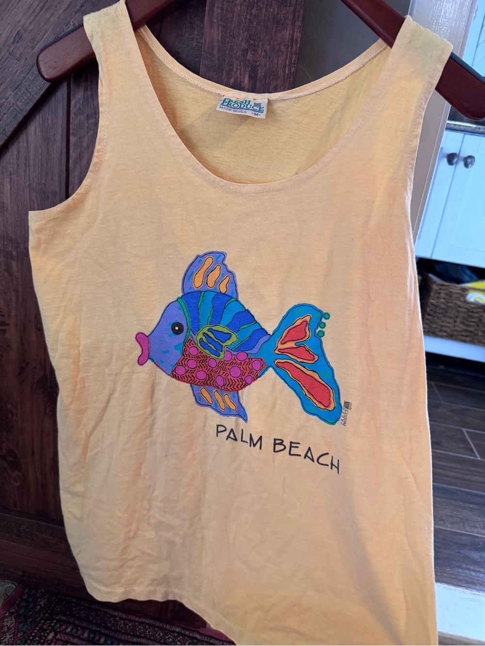 fresh produce Peach Tank with Vibrant Multicolor Fish Palm beach